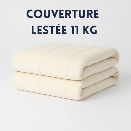 Couverture lestée 11 kg crème pliée sur un fond blanc Image