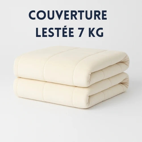 Couverture lestée 7 kg crème pliée sur un fond blanc Image