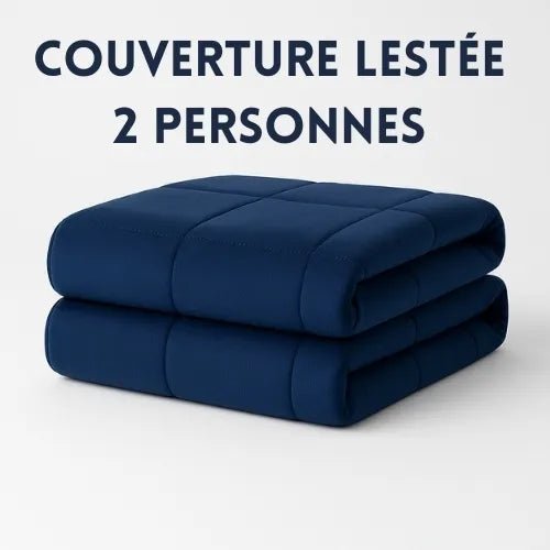 Couverture lestée deux personnes bleu pliée sur un fond blanc Image