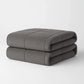 Couverture lestée de 9 kg grise pour 2 personnes pliée